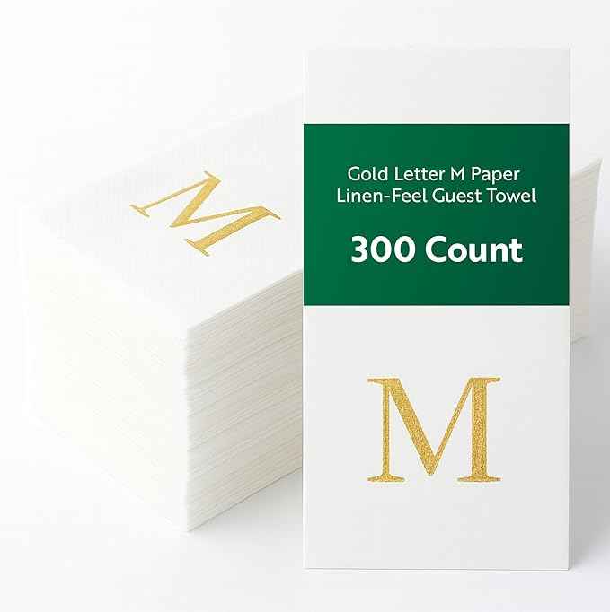 Restaurantware Napkins Pack of 300 Gold Letter M Linen-Feel Paper Disposable Guest Towels 15.75 x 7.87 Inches, Elegant Airlaid White Napkins For Birthdays, Weddings and Catering Events