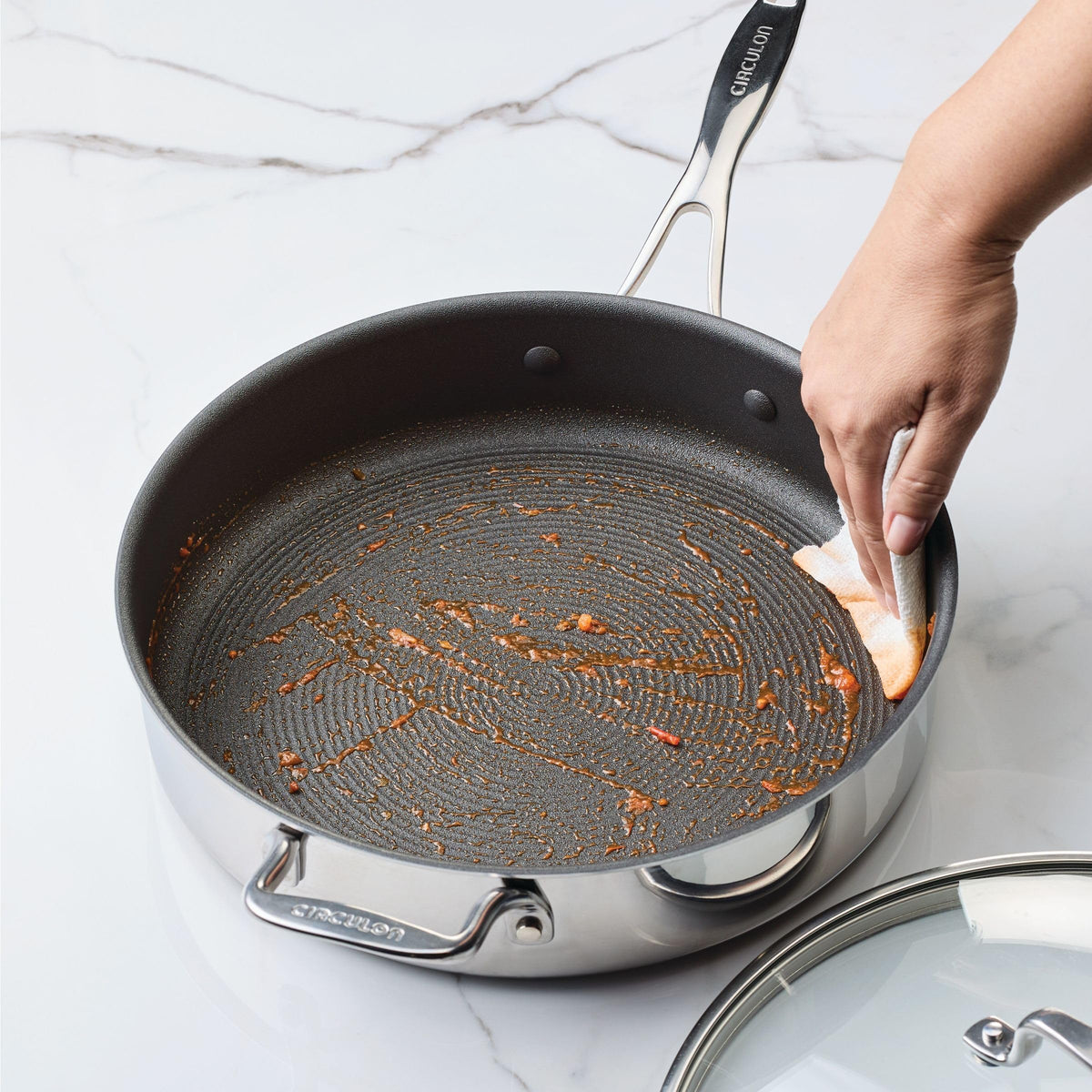 C1 Series Clad Stainless Steel with ScratchDefense Technology Cookware Nonstick Induction Saute Pan with Lid and Helper Handle (5 Quart)